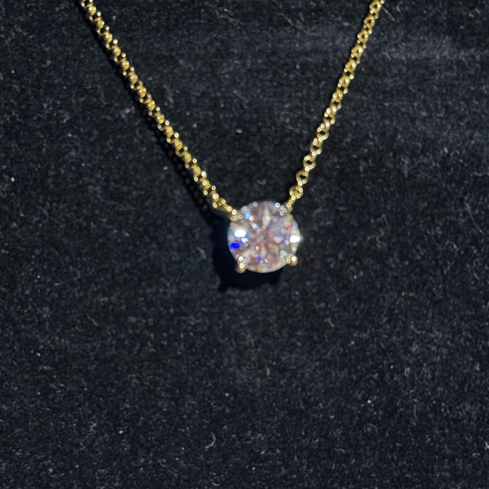 Moissanite Diamond 3c necklace, color D , Vvs1 color on gold tone chain.